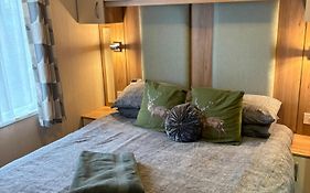 Woodpecker Lodge, Camelot Holiday Park, Ca6 5Sz